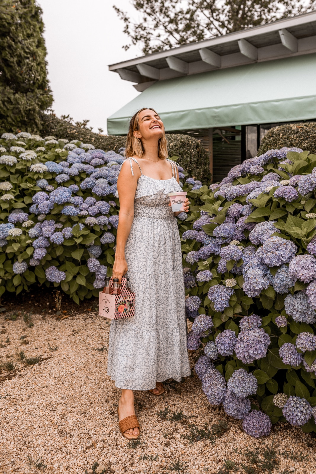 Camille Carter surrounded by floers in The Roundtree