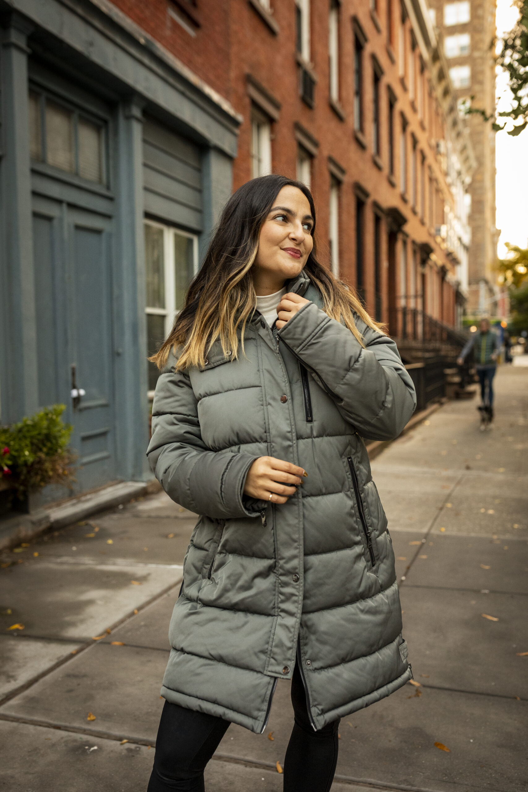 woman wearing a long coat for Cold Weather Essentials for Winter