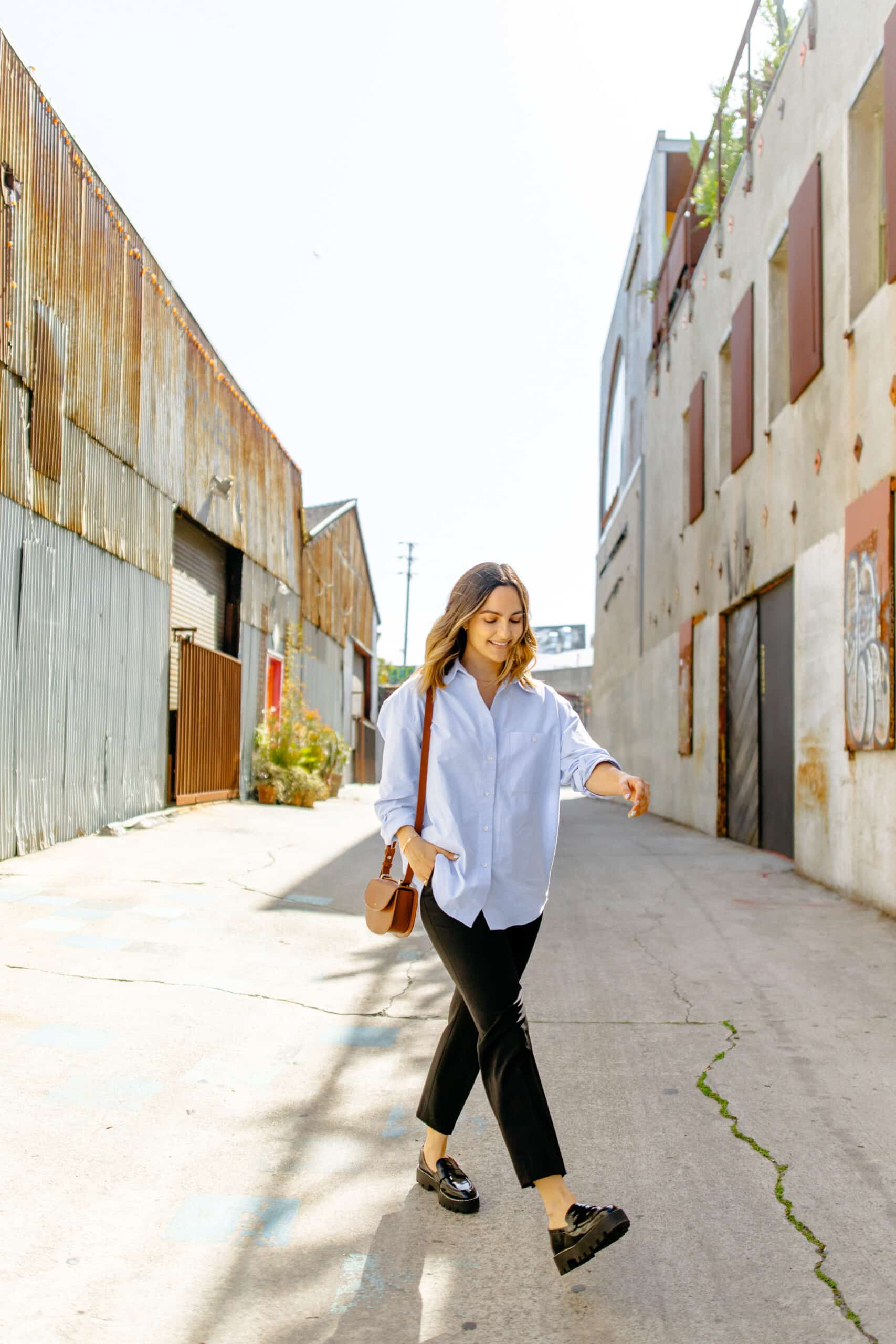 Black pants with blue button down shirt Black pants with blue button down shirt