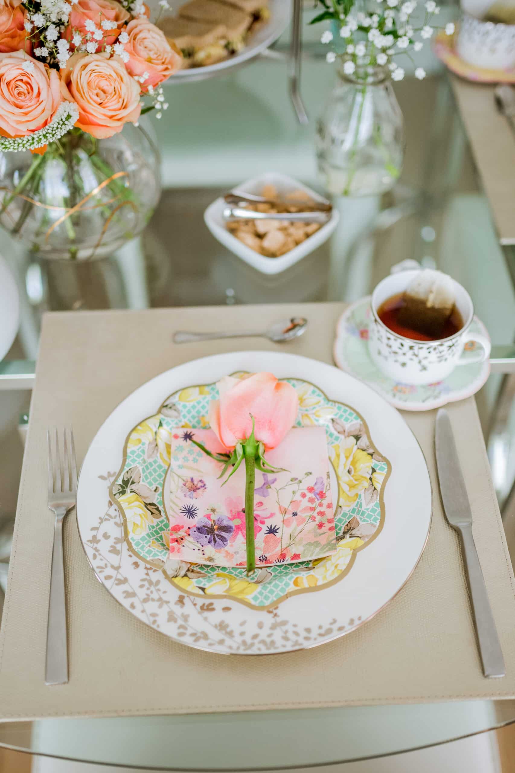 floral table setting for How To Host A Tea Party At Home