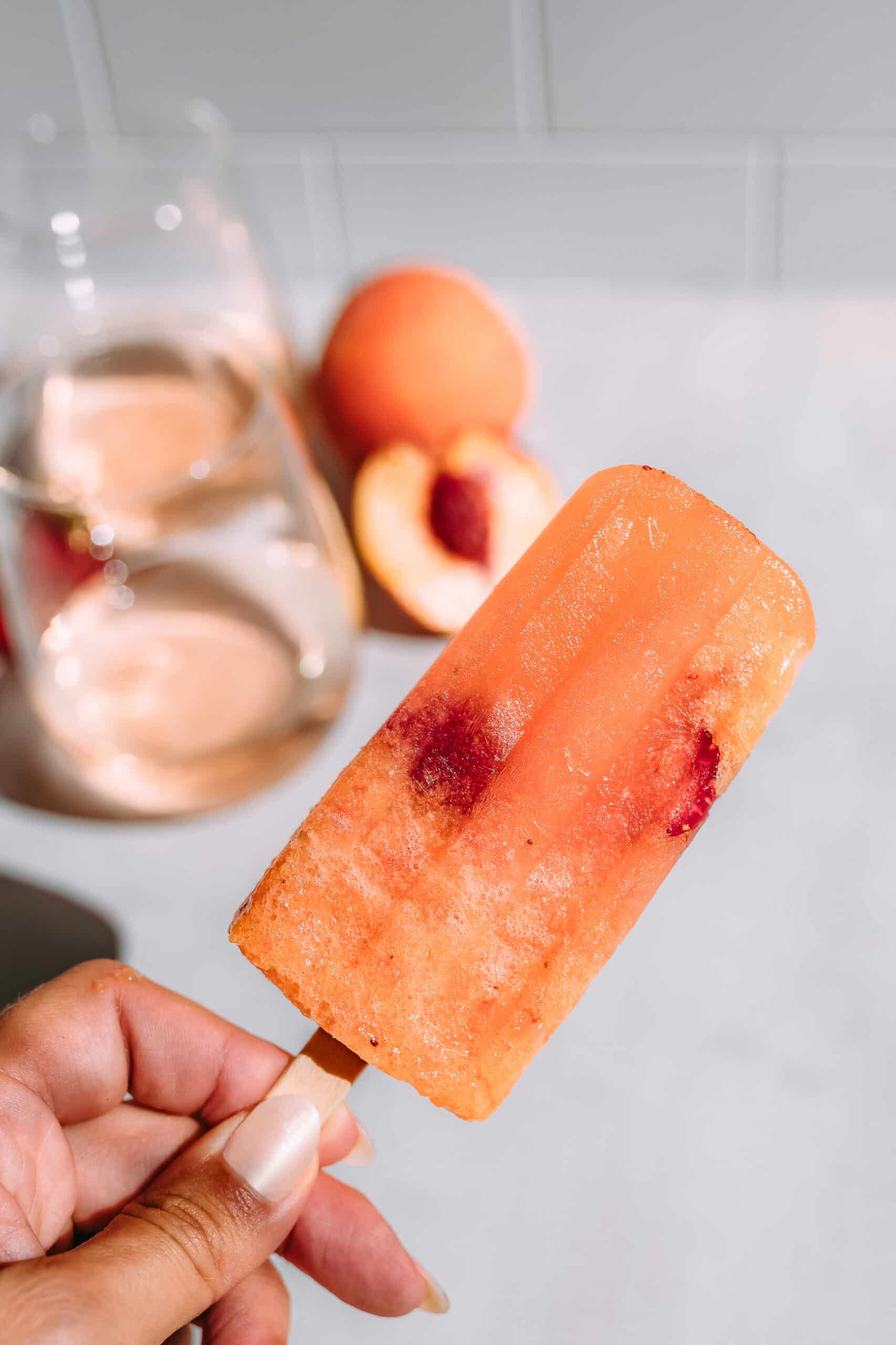 Peach and Strawberry Rose Popsicles, Rosé popsicles, boozy popsicles | Charmed by Camille