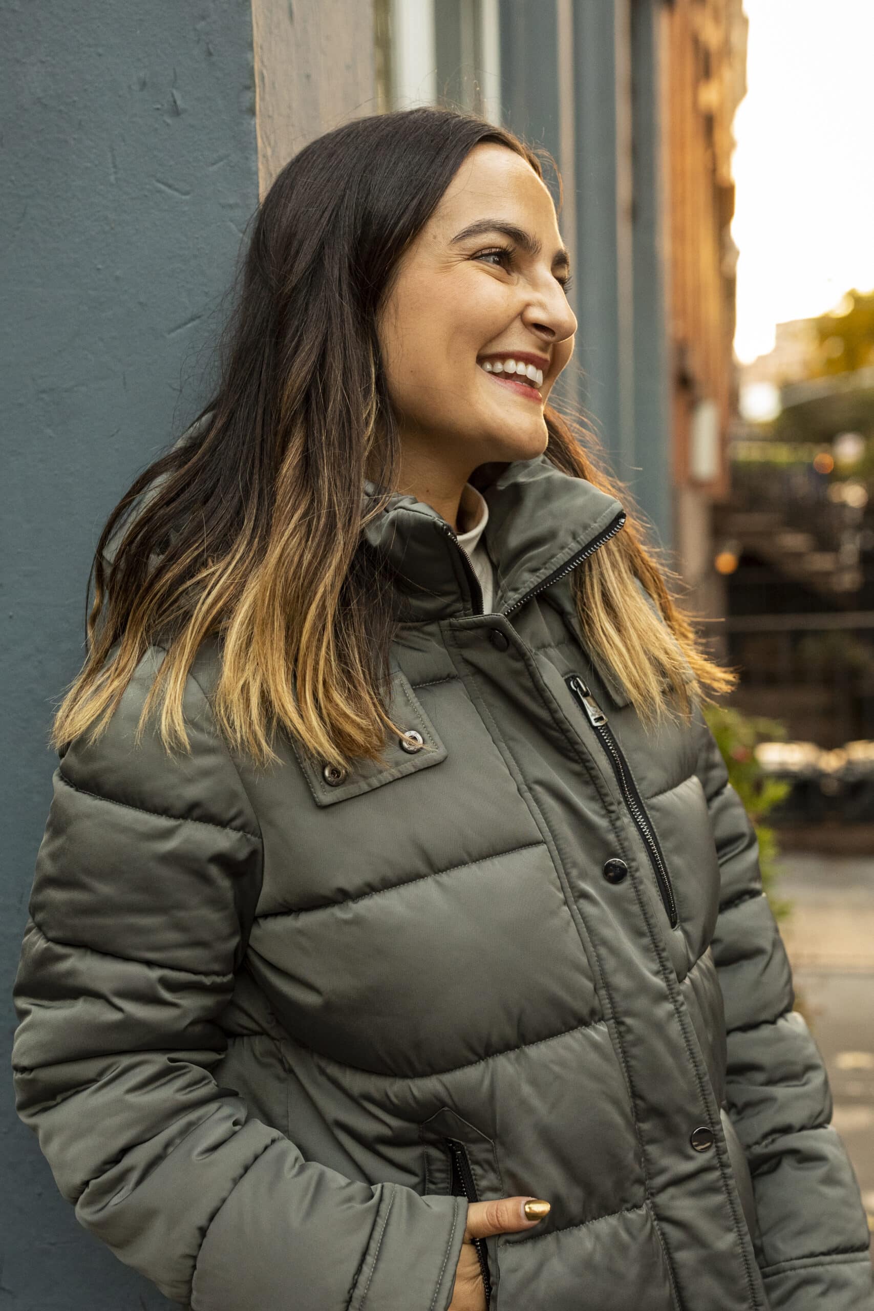 woman smiling and sharing her Wintertime Skincare Routine