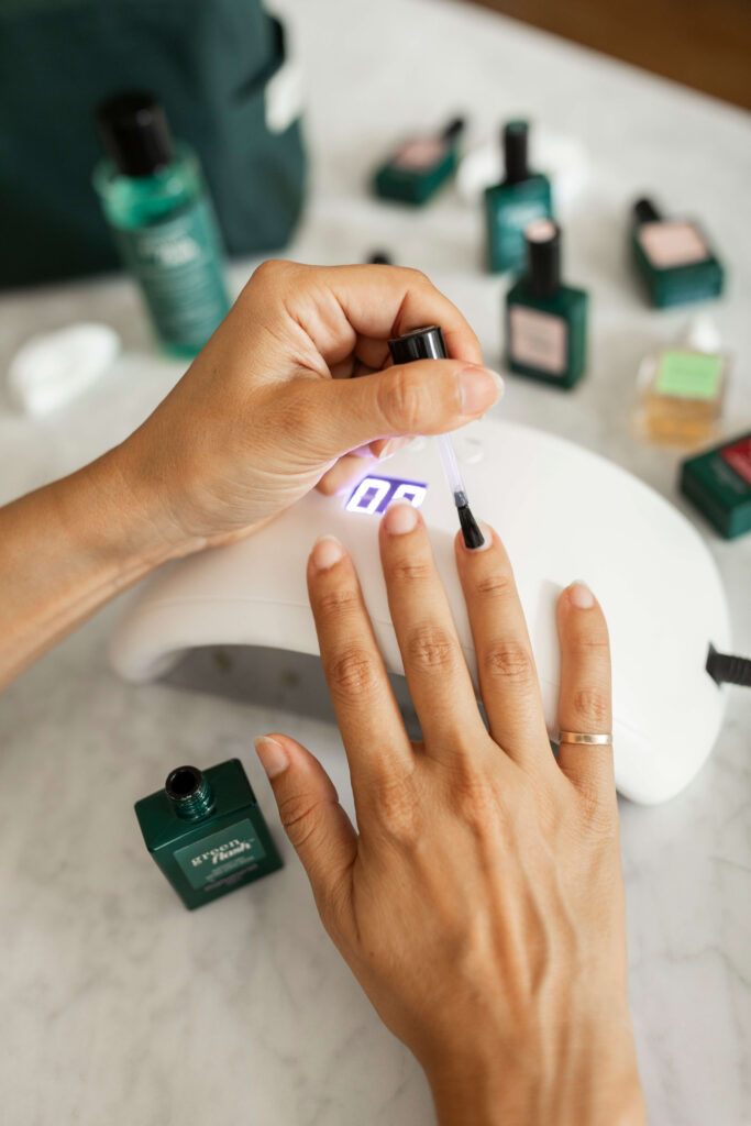 Charmed by Camille putting her nails under the LED light for Manucurist review