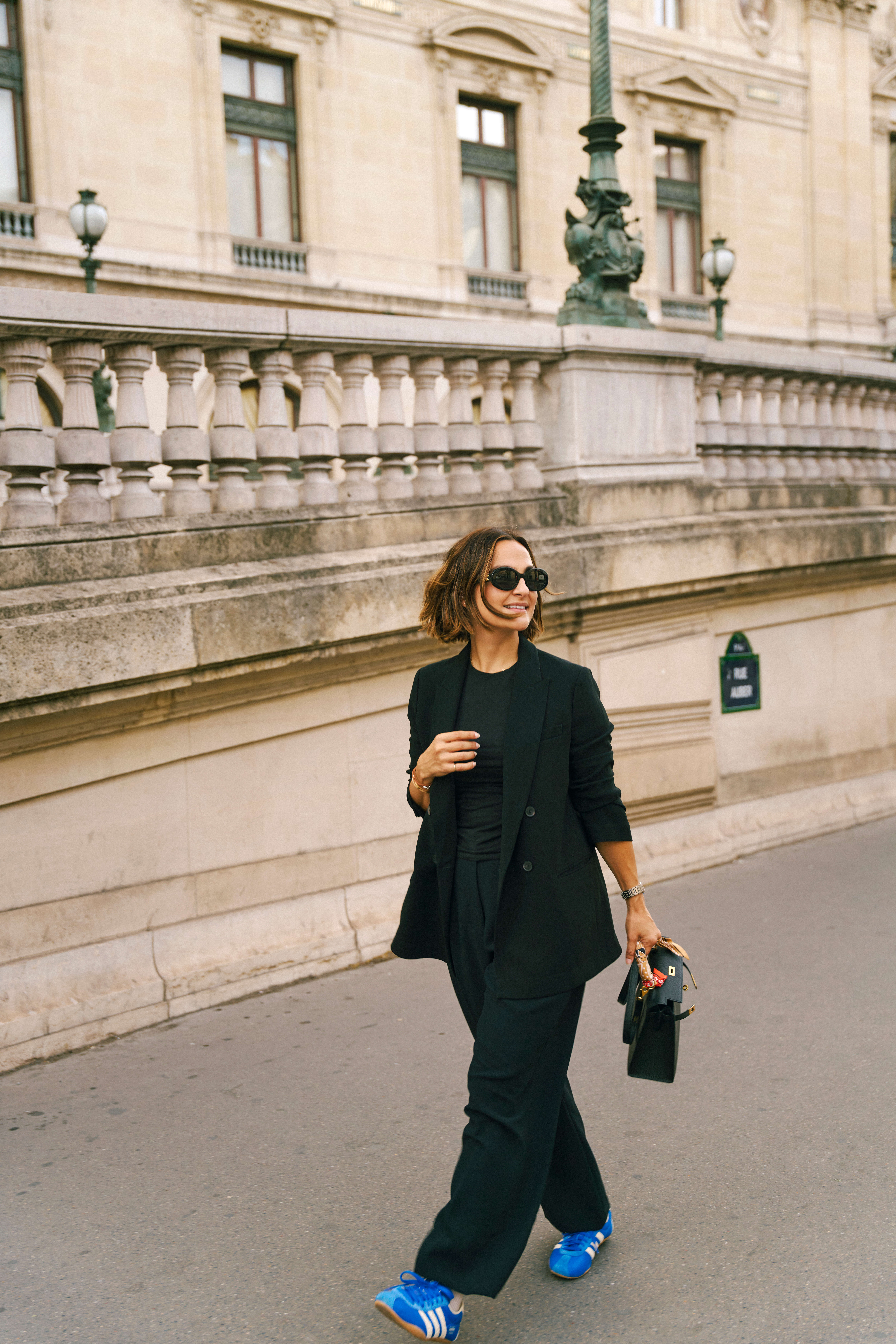 black pants and blazer with sneakers
